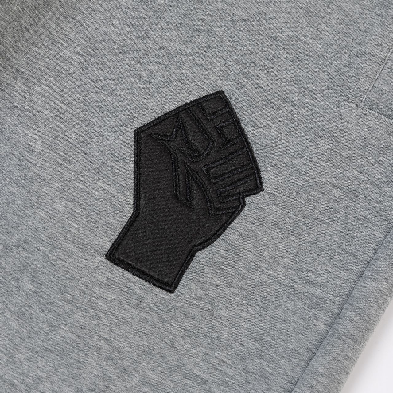 Unisex Black Fist Performance Tech Pants - Image 3